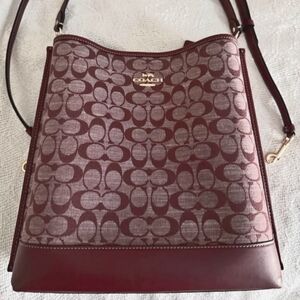 Burgundy coach purse